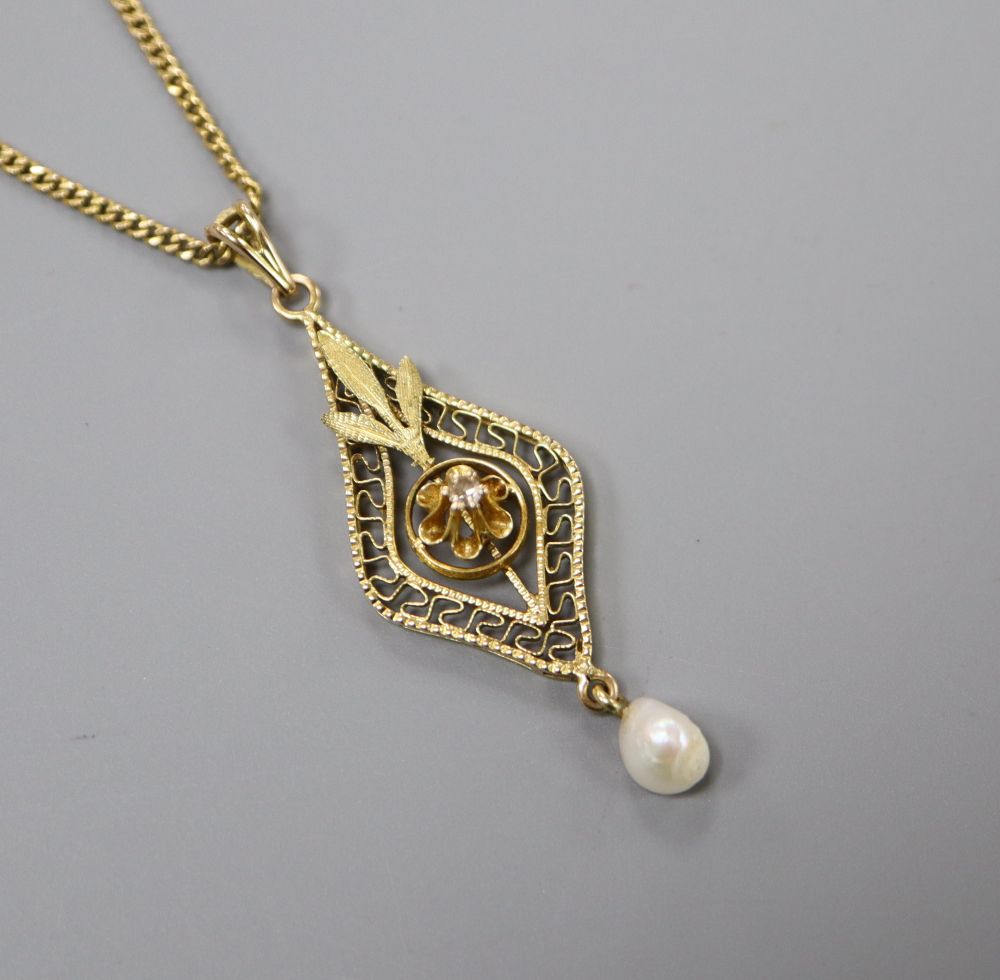 A pierced yellow metal, diamond and baroque pearl drop pendant, 33mm, gross 1.5 grams, on a gold filled chain.